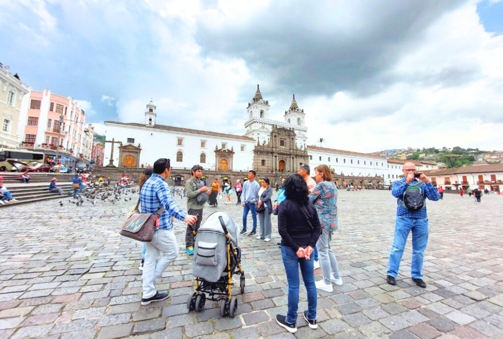 Group of tourists in the centre of Quito, Ecuador