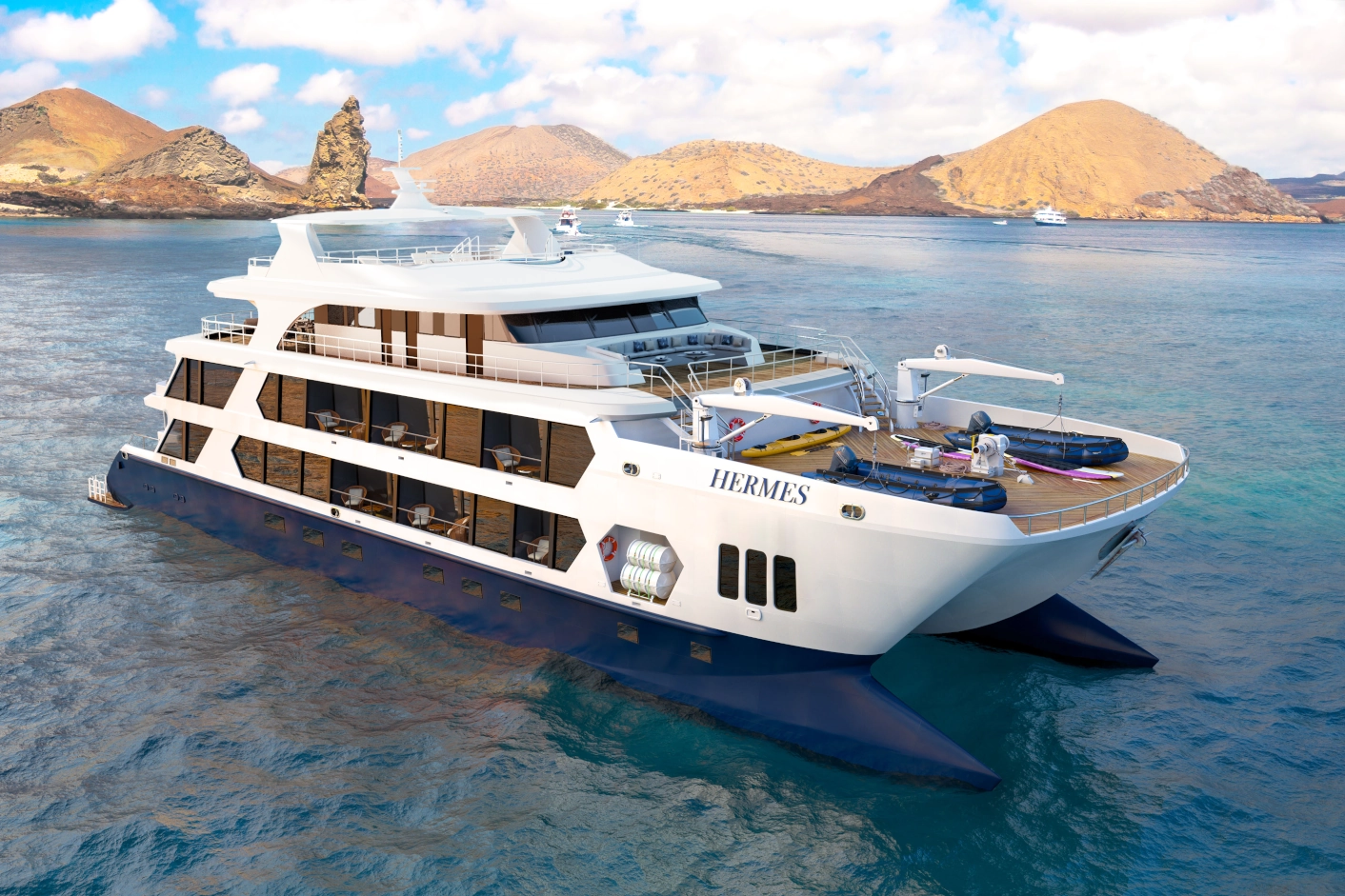 render image of the ultra-luxury mega catamaran Hermes. Aerial view of the catamaran in front of Bartholomew Island in the Galapagos Islands.